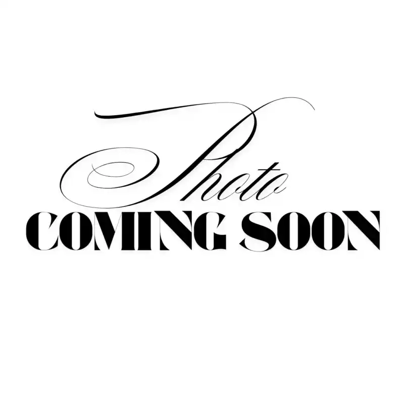 Portrait of Sherri, a professional stylist at Above All Grand Salon & Spa, showcasing their expertise and style.