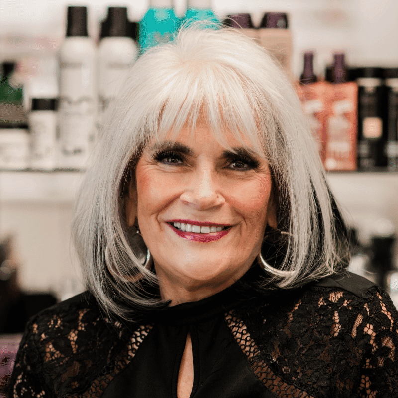 Portrait of Anne Fusko, a professional stylist at A Finished Appearance, showcasing their expertise and style.