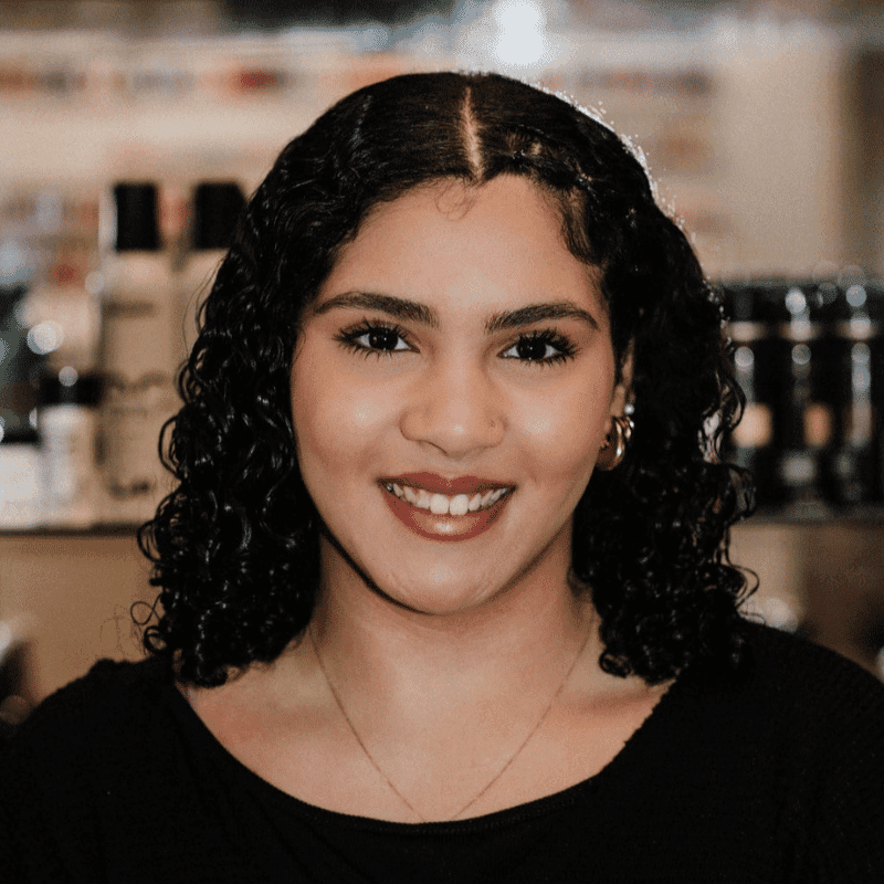 Portrait of Maia Chin, a professional stylist at A Finished Appearance, showcasing their expertise and style.