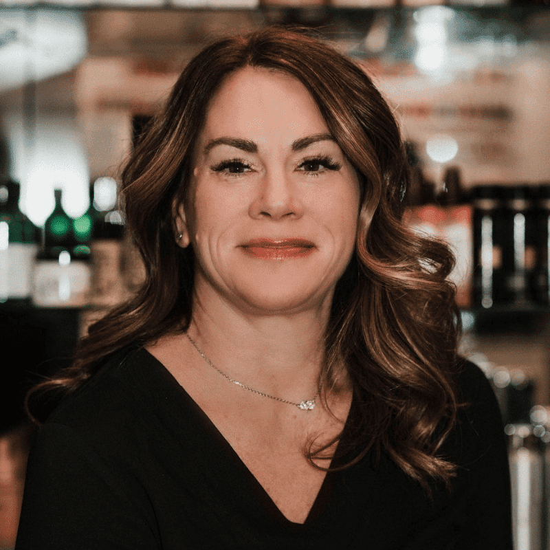 Portrait of Jessica Beck, a professional stylist at A Finished Appearance, showcasing their expertise and style.