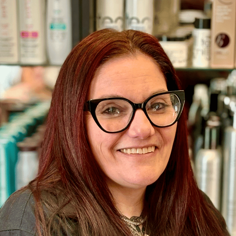 Portrait of Jennifer, a professional stylist at A Finished Appearance, showcasing their expertise and style.