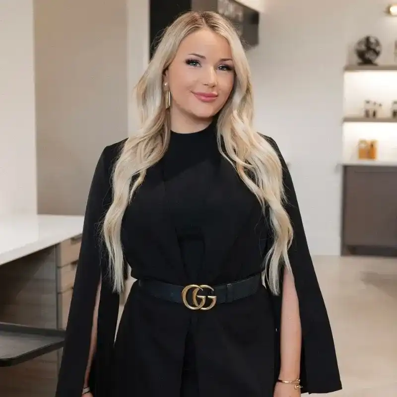 Portrait of Isabelle, a professional stylist at Bonjour Belle Salon, showcasing their expertise and style.