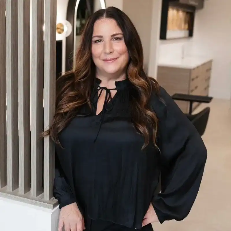 Portrait of Christina, a professional stylist at Bonjour Belle Salon, showcasing their expertise and style.