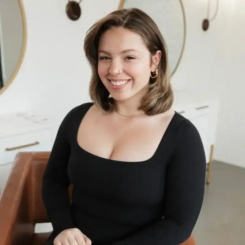 Portrait of Marilyn, a professional stylist at Bonjour Belle Salon, showcasing their expertise and style.