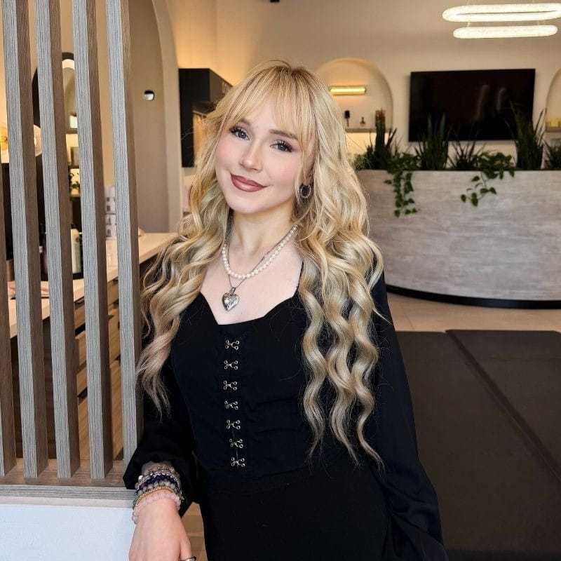 Portrait of Laureli, a professional stylist at Bonjour Belle Salon, showcasing their expertise and style.