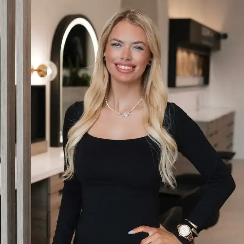 Portrait of Summer, a professional stylist at Bonjour Belle Salon, showcasing their expertise and style.