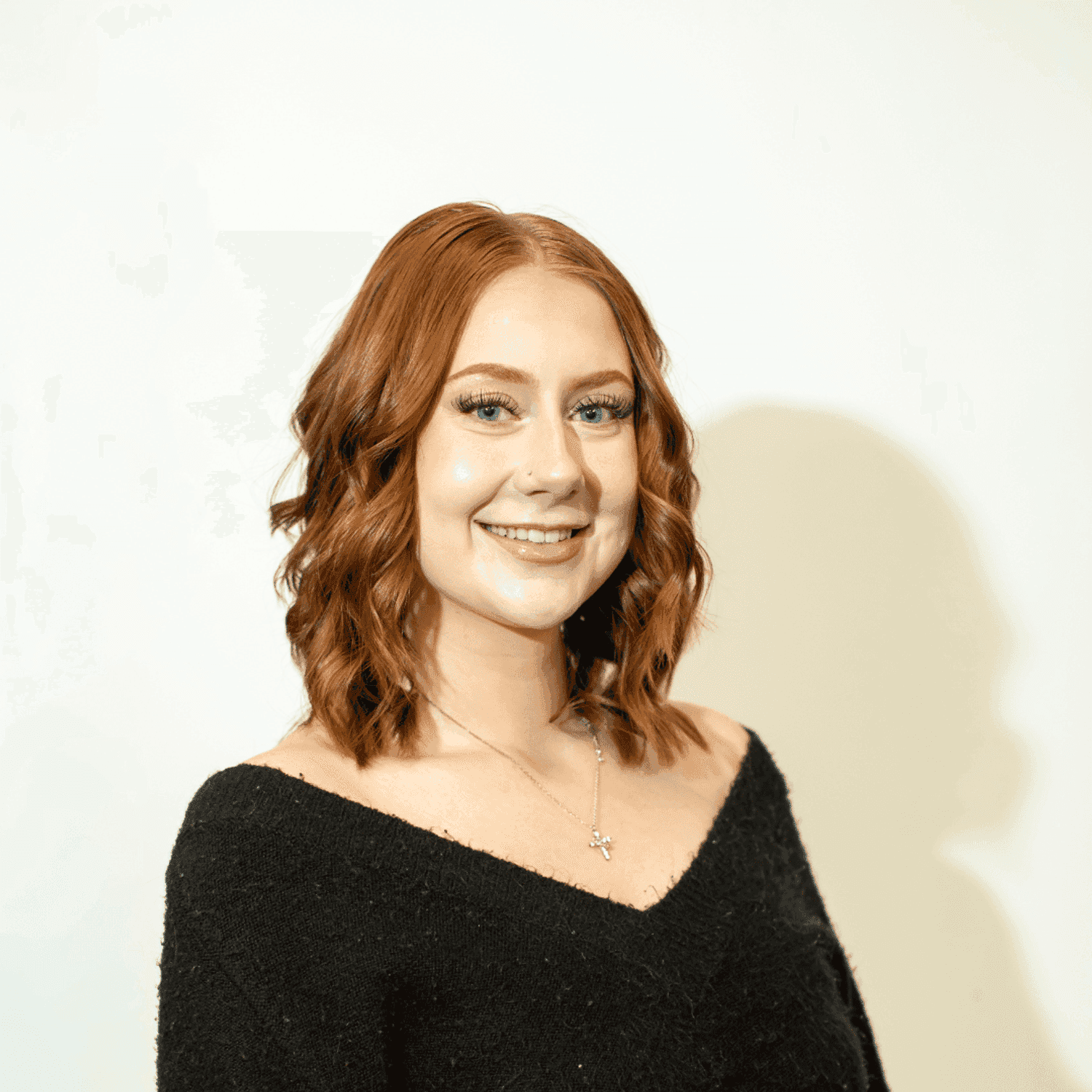 Portrait of Lillian Wilson, a professional stylist at Brown & DeLine Salon, showcasing their expertise and style.