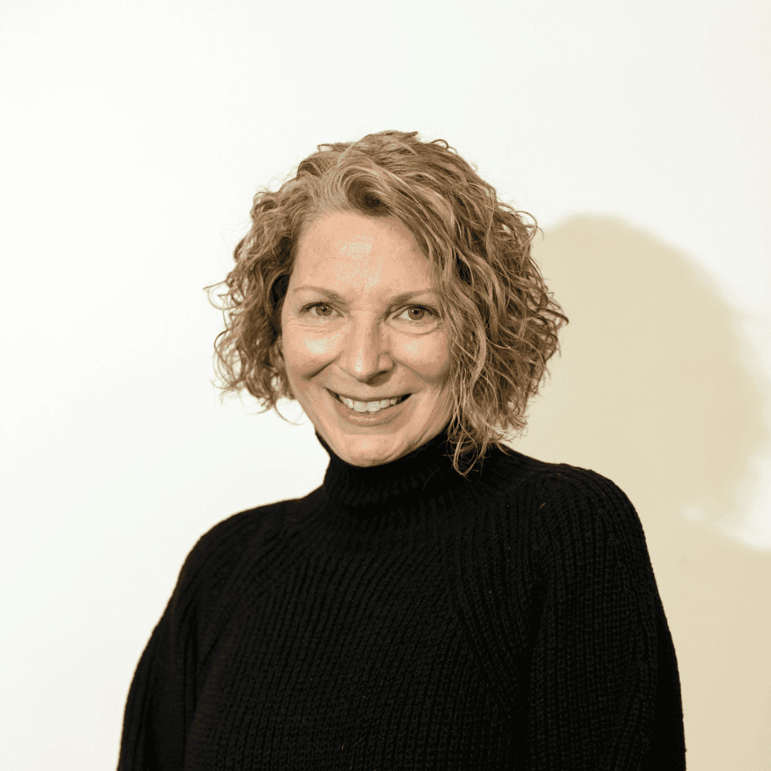 Portrait of Jill Hartmeyer, a professional stylist at Brown & DeLine Salon, showcasing their expertise and style.