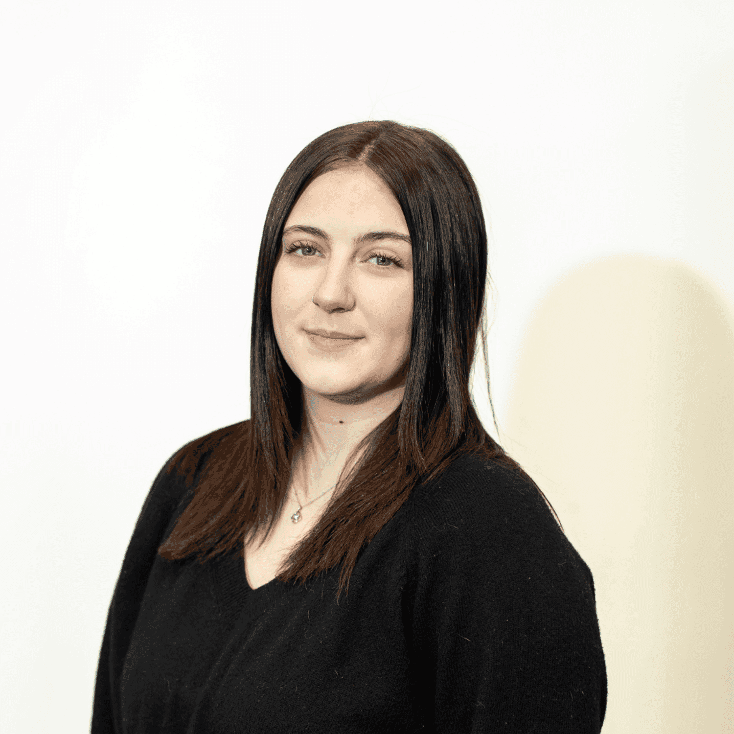 Portrait of Samantha Poley, a professional stylist at Brown & DeLine Salon, showcasing their expertise and style.