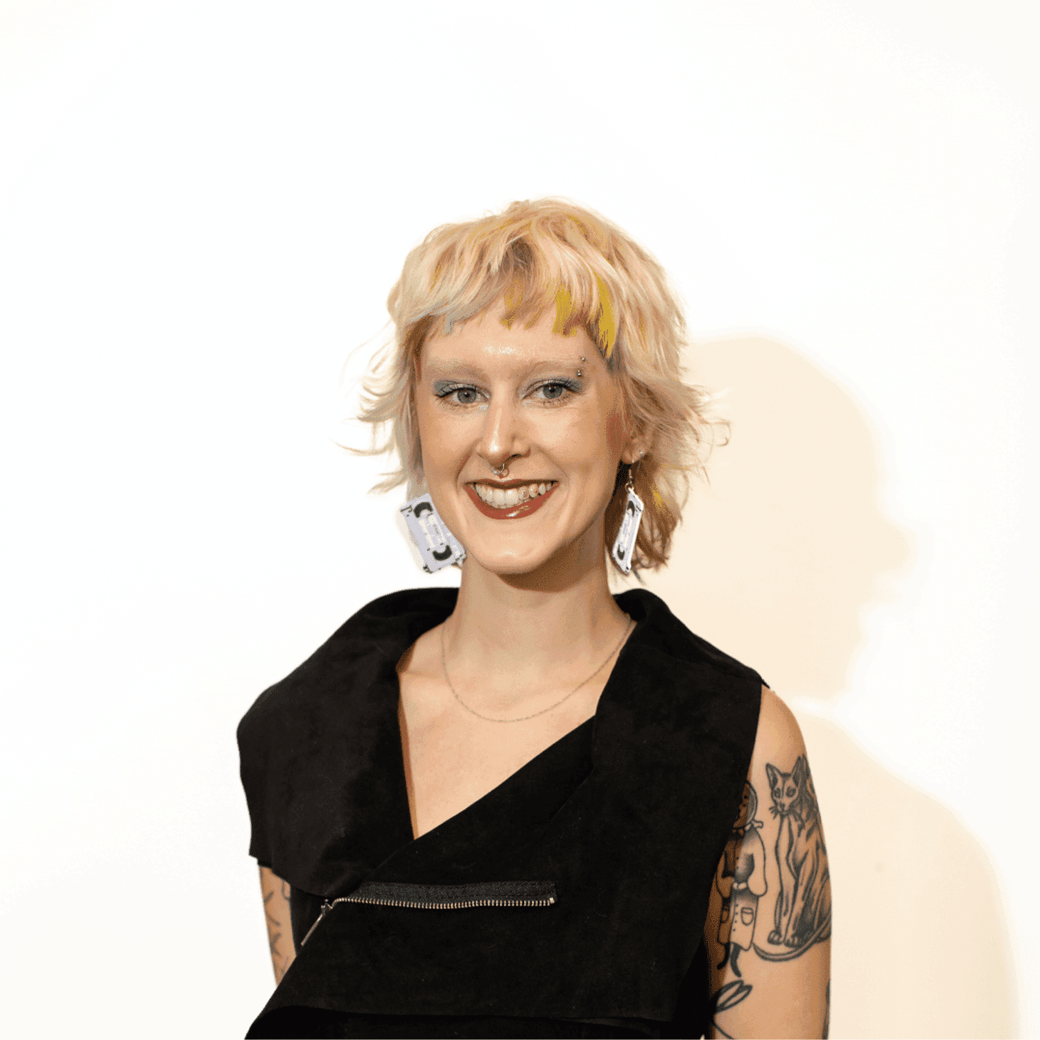 Portrait of Callie Motsinger, a professional stylist at Brown & DeLine Salon, showcasing their expertise and style.