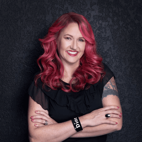 Portrait of Lashon Taylor, a professional stylist at Educe Salon, showcasing their expertise and style.