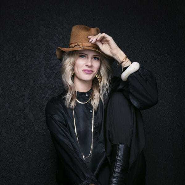 Portrait of Alicia Rosado, a professional stylist at Educe Salon, showcasing their expertise and style.