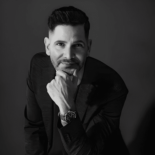 Portrait of Phillip Rosado, a professional stylist at Educe Salon, showcasing their expertise and style.