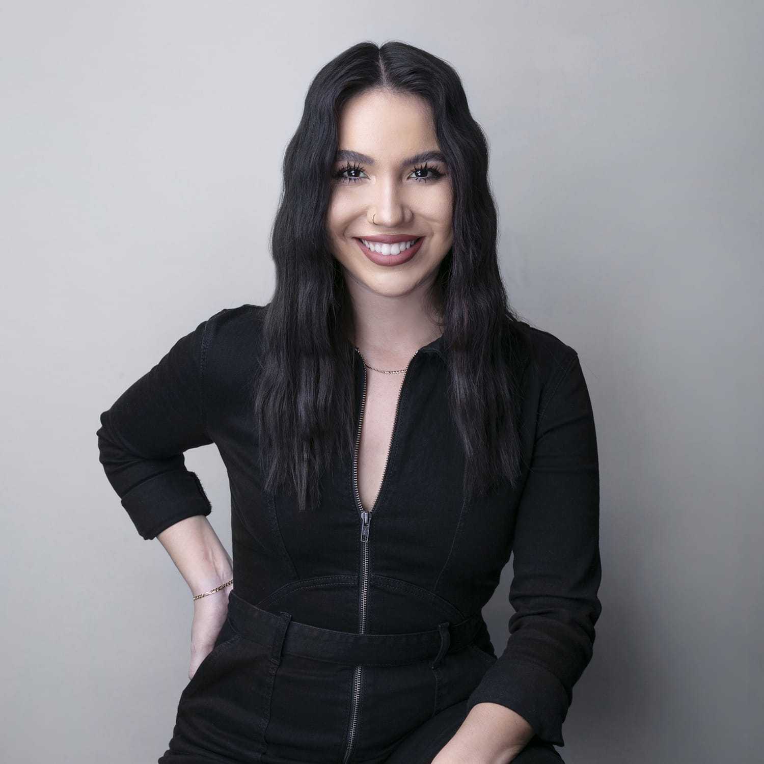Portrait of Jaden Rosado, a professional stylist at Educe Salon, showcasing their expertise and style.