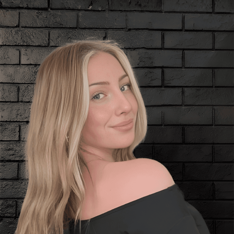 Portrait of Avery Birchall, a professional stylist at Educe Salon, showcasing their expertise and style.