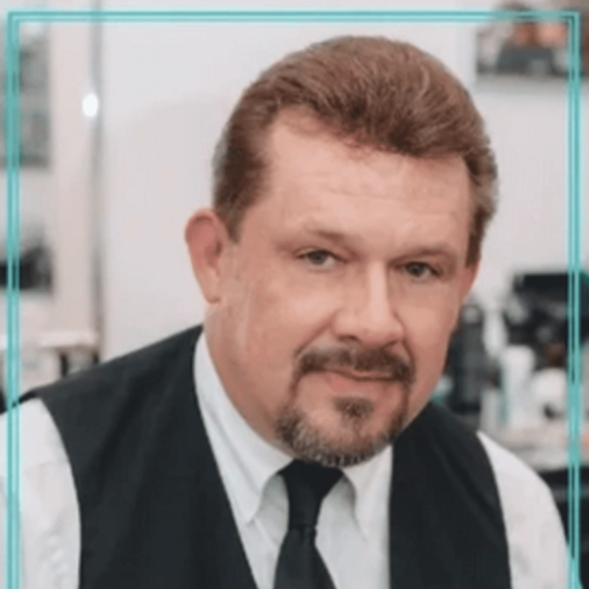 Portrait of Kirk Berry, a professional stylist at Hair After Style Quarters, showcasing their expertise and style.