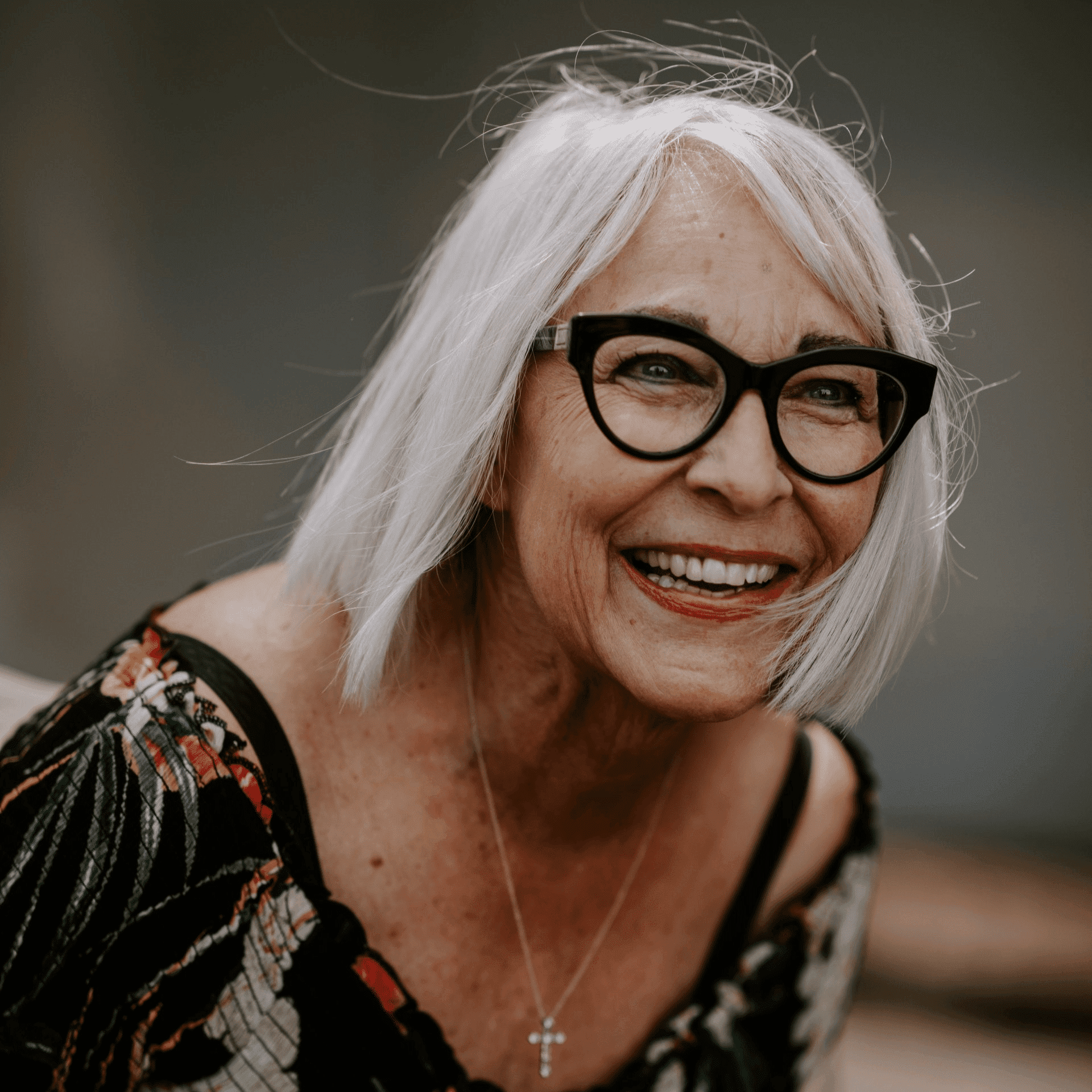 Portrait of Helen Piatt, a professional stylist at Hair Lounge, showcasing their expertise and style.