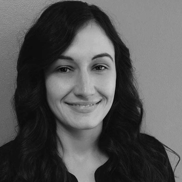Portrait of Brooke, a professional stylist at Indigo, showcasing their expertise and style.