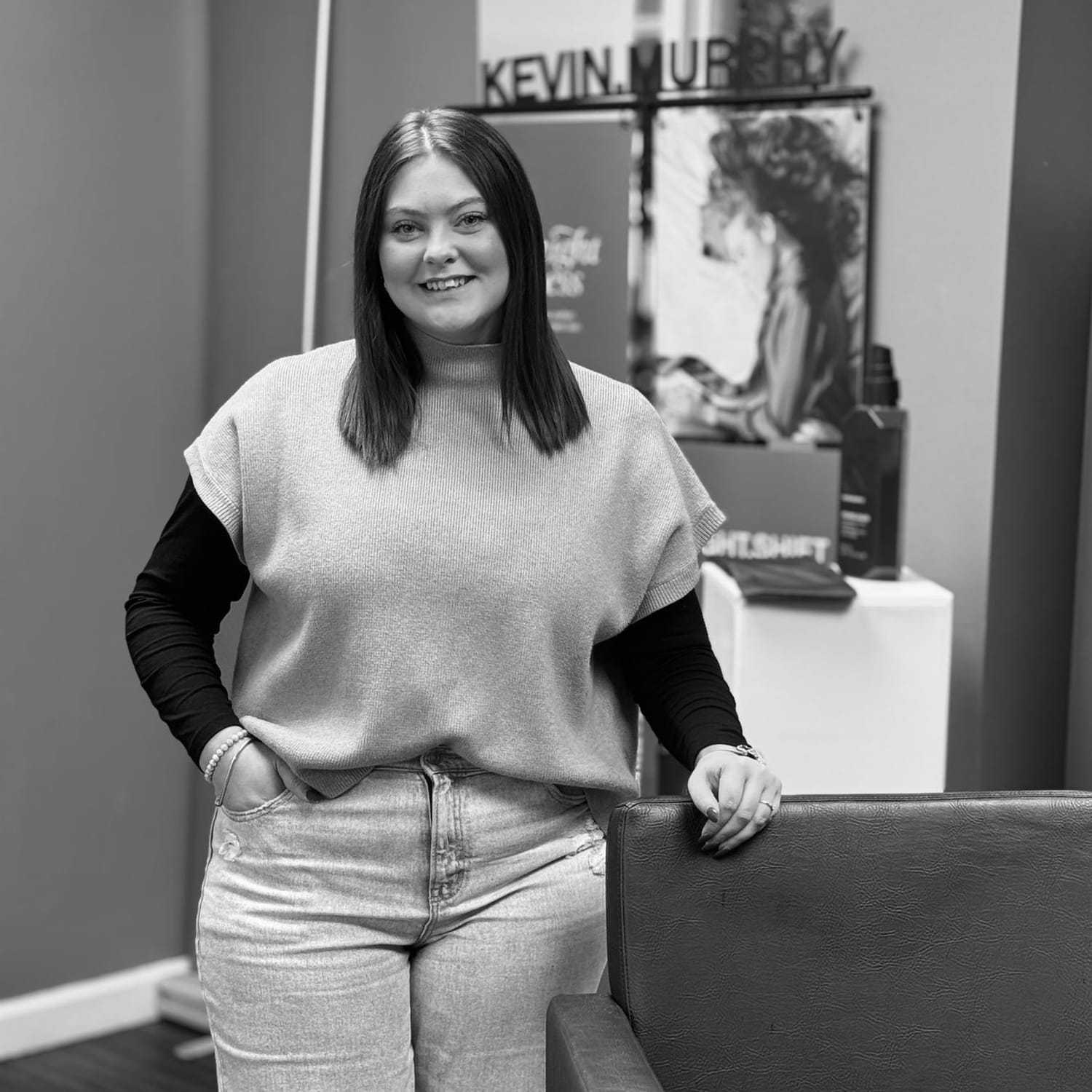 Portrait of Logan, a professional stylist at Indigo, showcasing their expertise and style.