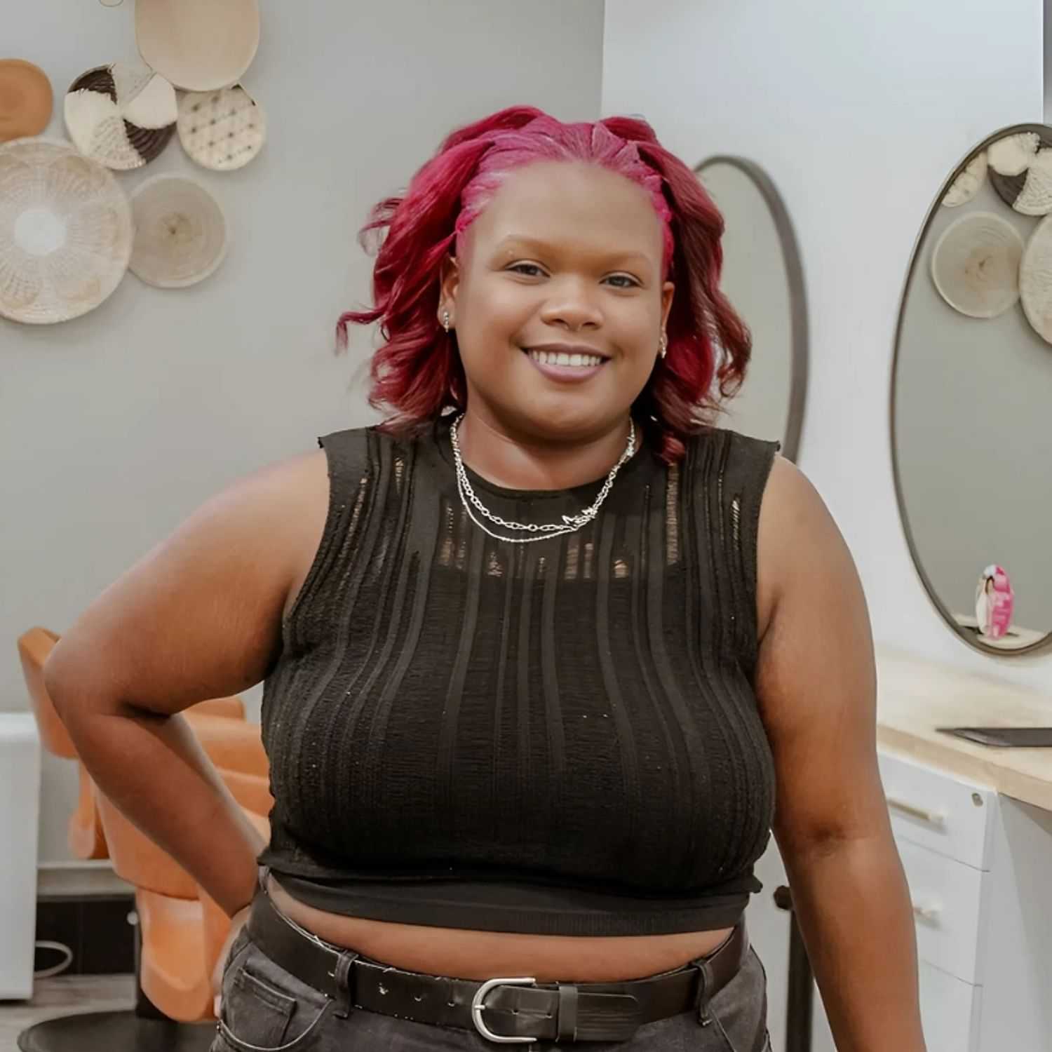 Portrait of Anastaja, a professional stylist at Posh Salon And Boutique, showcasing their expertise and style.