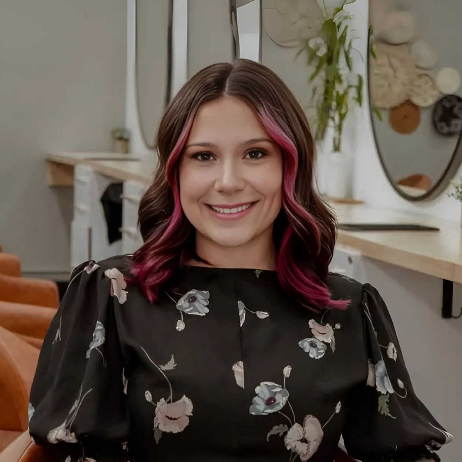 Portrait of Kayla, a professional stylist at Posh Salon And Boutique, showcasing their expertise and style.