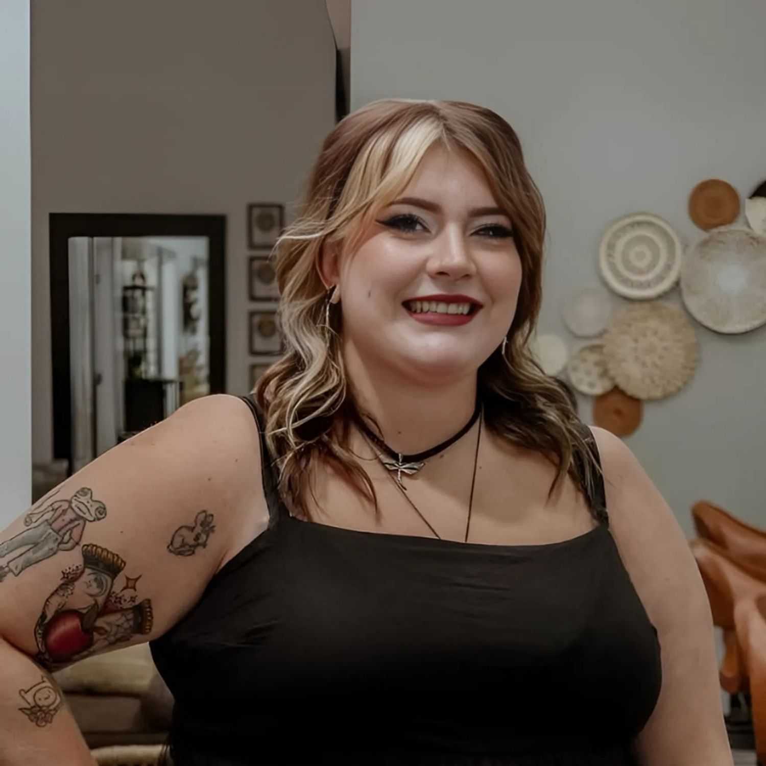 Portrait of Liberty, a professional stylist at Posh Salon And Boutique, showcasing their expertise and style.