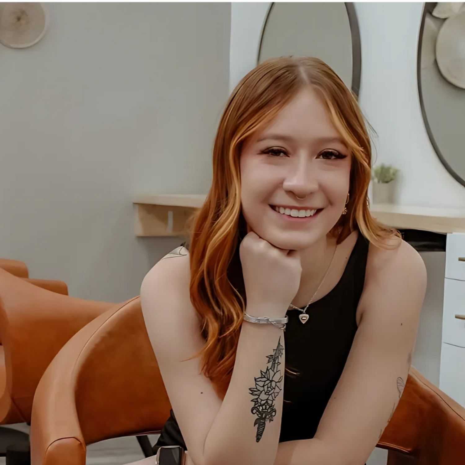 Portrait of Aly, a professional stylist at Posh Salon And Boutique, showcasing their expertise and style.