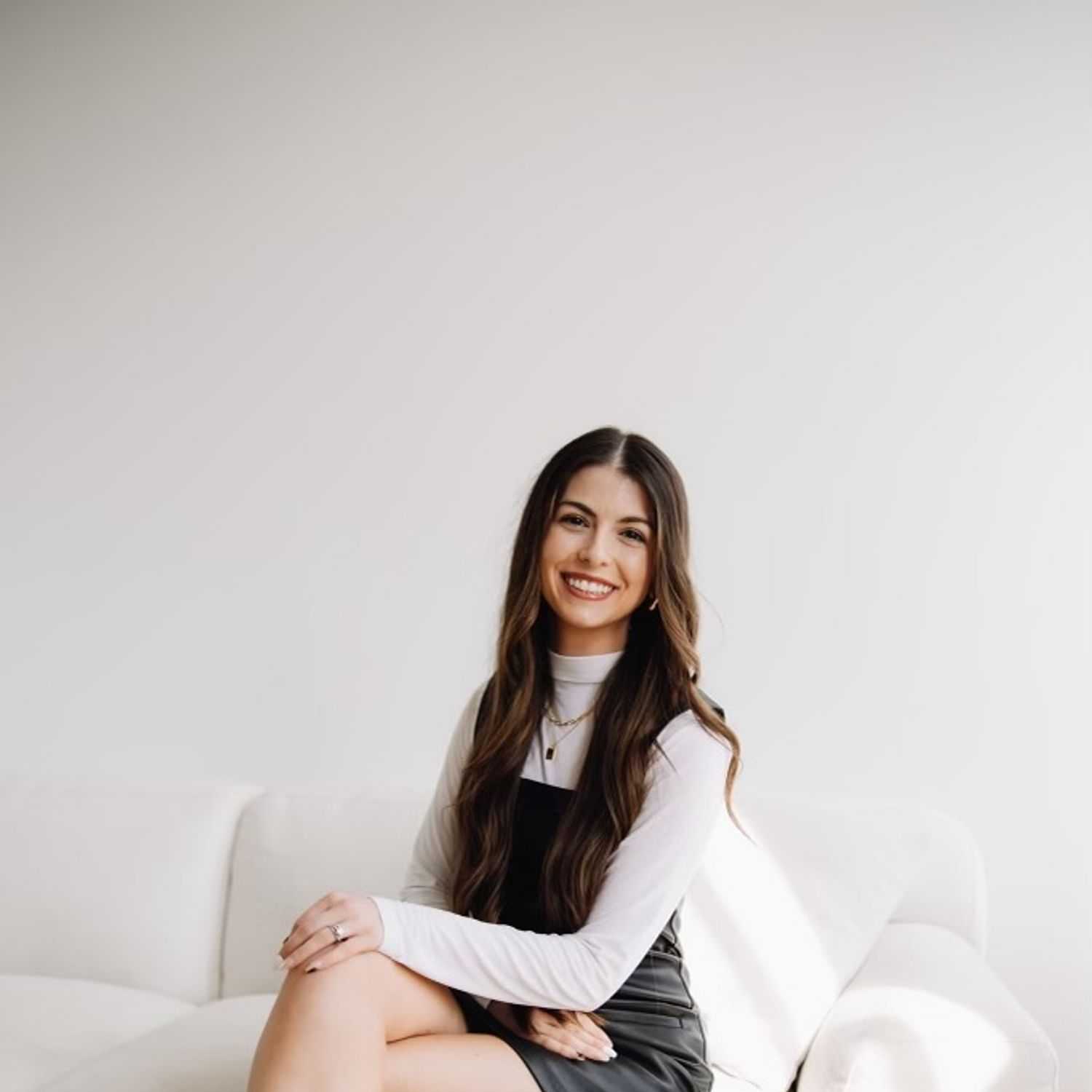 Portrait of Allie Harris, a professional stylist at Revive Hair Salon & Day Spa, showcasing their expertise and style.