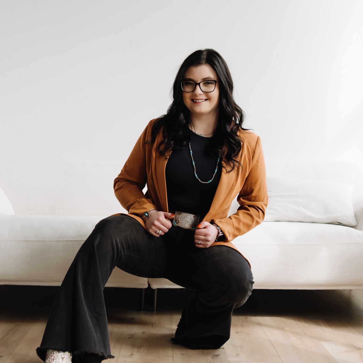 Portrait of Ashley Maag, a professional stylist at Revive Hair Salon & Day Spa, showcasing their expertise and style.
