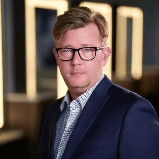 Portrait of Jason, a professional stylist at Salon Bliss & Spa, showcasing their expertise and style.