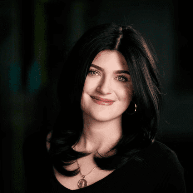 Portrait of Alaina Cavalier, a professional stylist at Salon Bliss & Spa, showcasing their expertise and style.