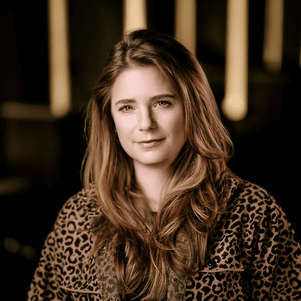 Portrait of Devon, a professional stylist at Salon Bliss & Spa, showcasing their expertise and style.