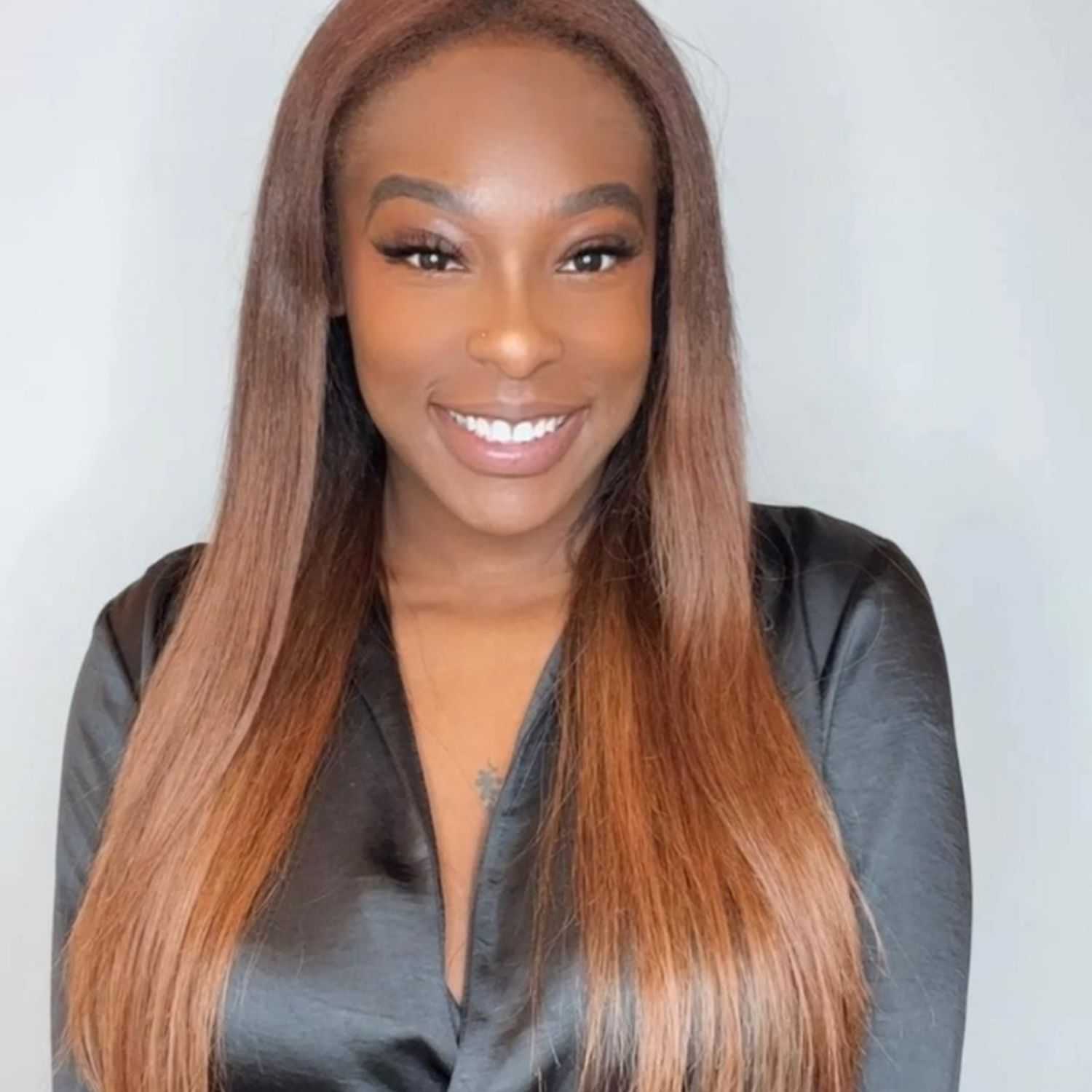 Portrait of Ari, a professional stylist at [salon] 718, showcasing their expertise and style.