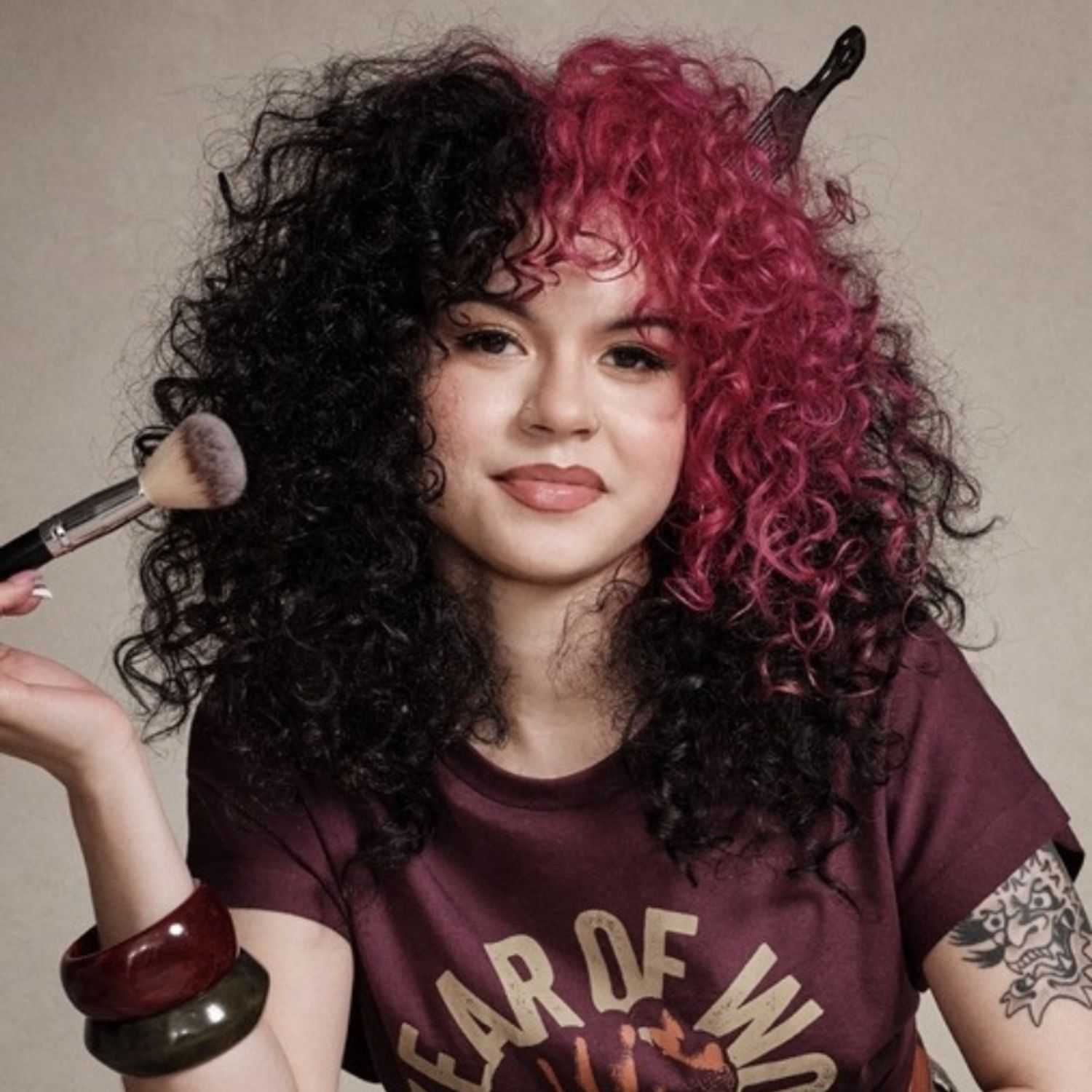 Portrait of Sophie, a professional stylist at [salon] 718, showcasing their expertise and style.