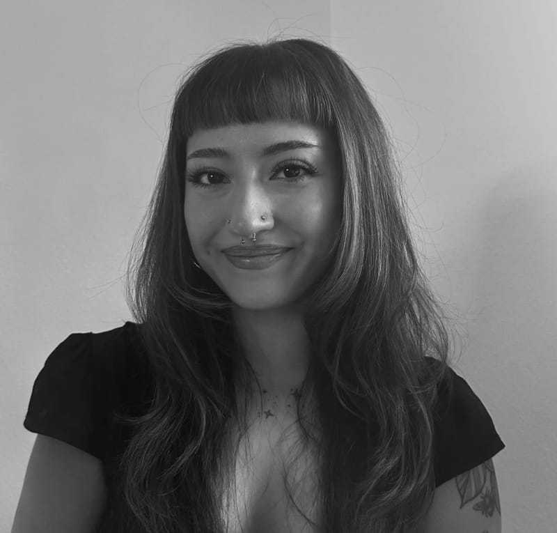 Portrait of Katya Behrens, a professional stylist at Salon Savoir, showcasing their expertise and style.