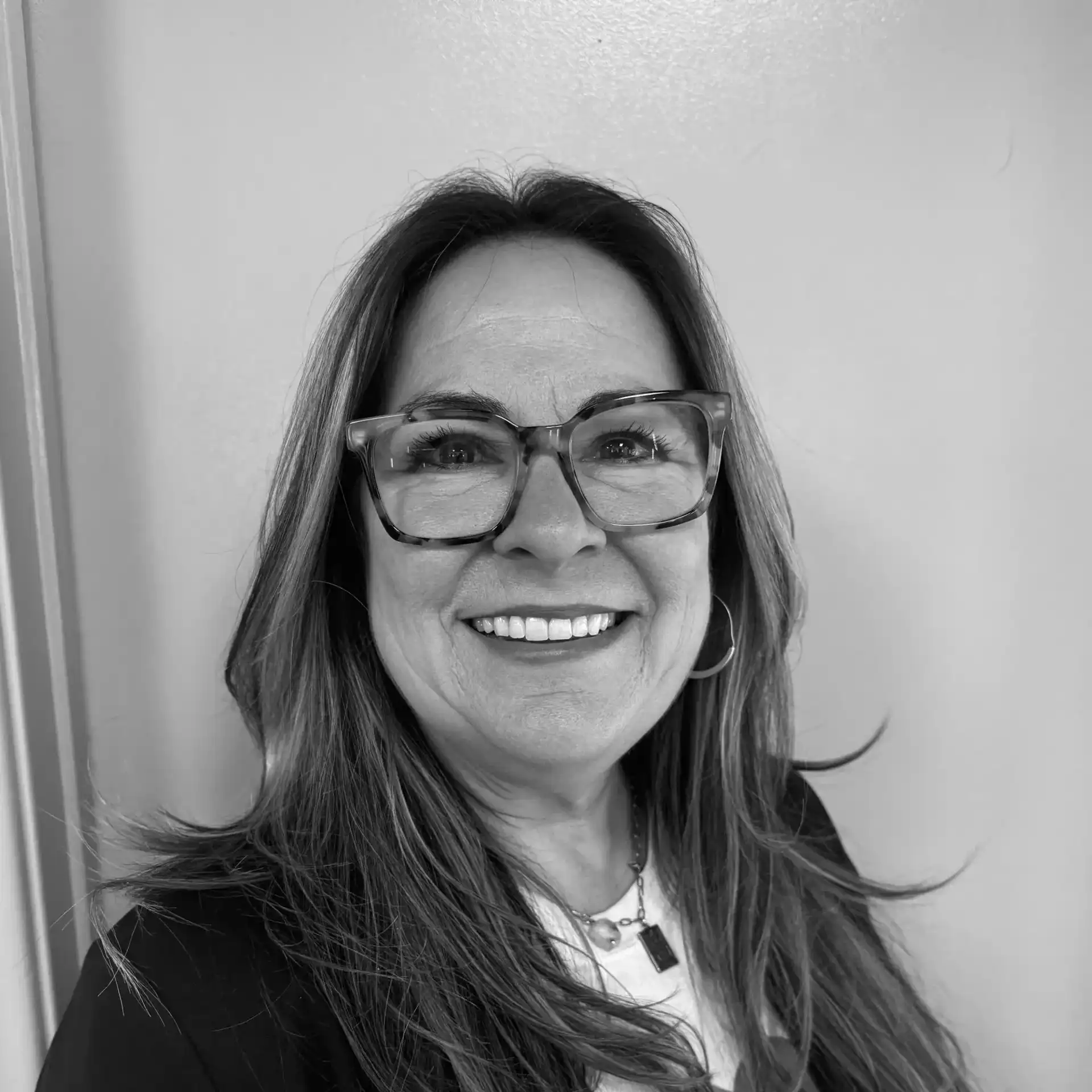 Portrait of Nancy Lee, a professional stylist at Salon Savoir, showcasing their expertise and style.