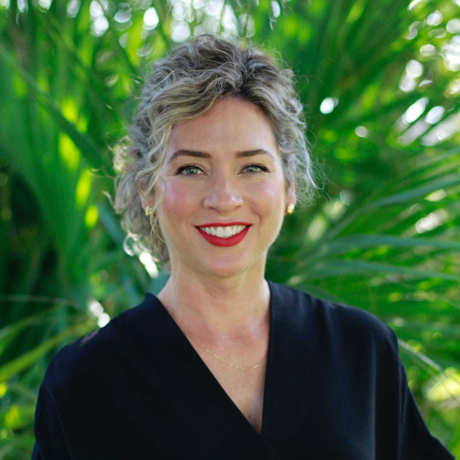 Portrait of Christin, a professional stylist at Scarborough's Salon & Day Spa, showcasing their expertise and style.