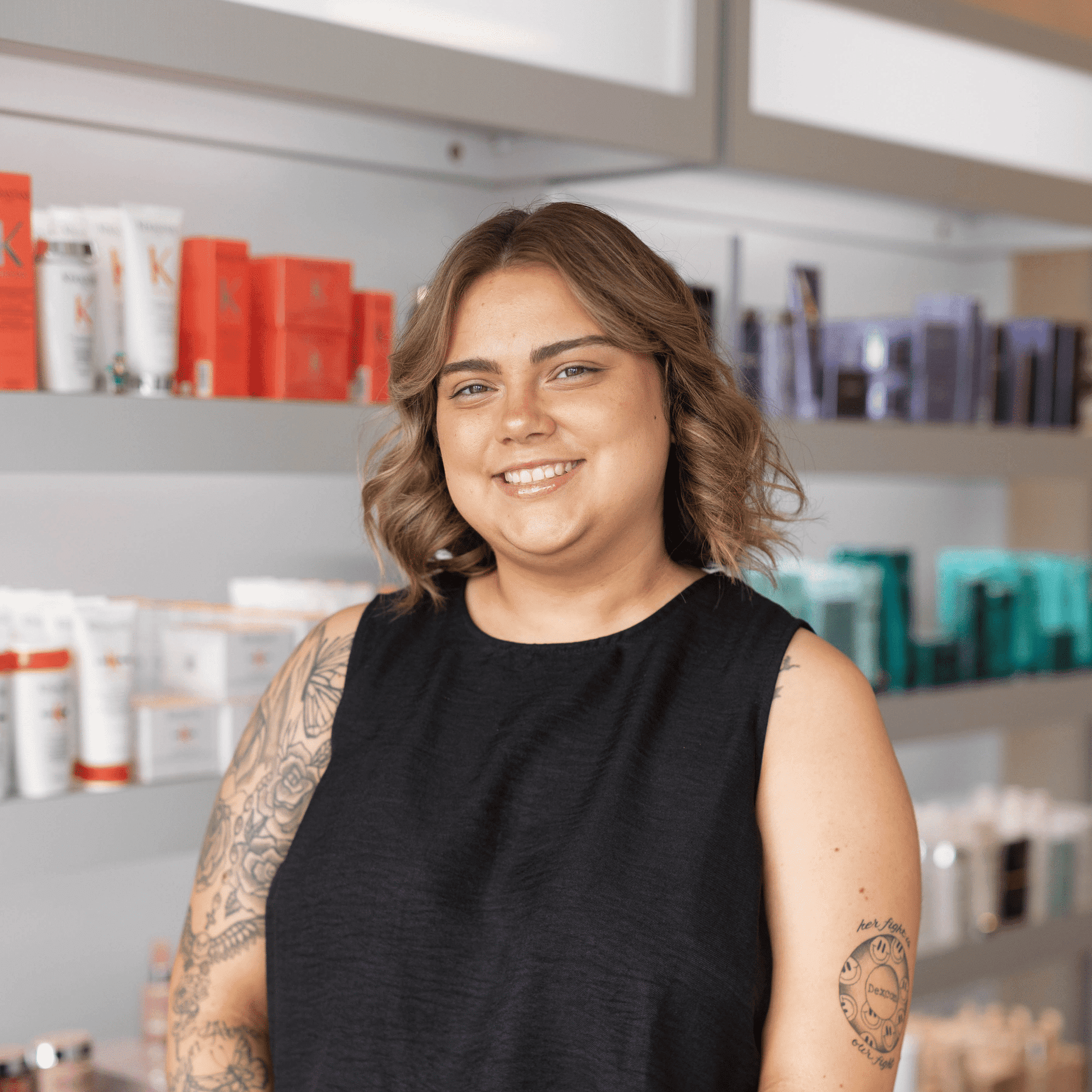 Portrait of Vanessa, a professional stylist at Sweet Betty Salon, showcasing their expertise and style.