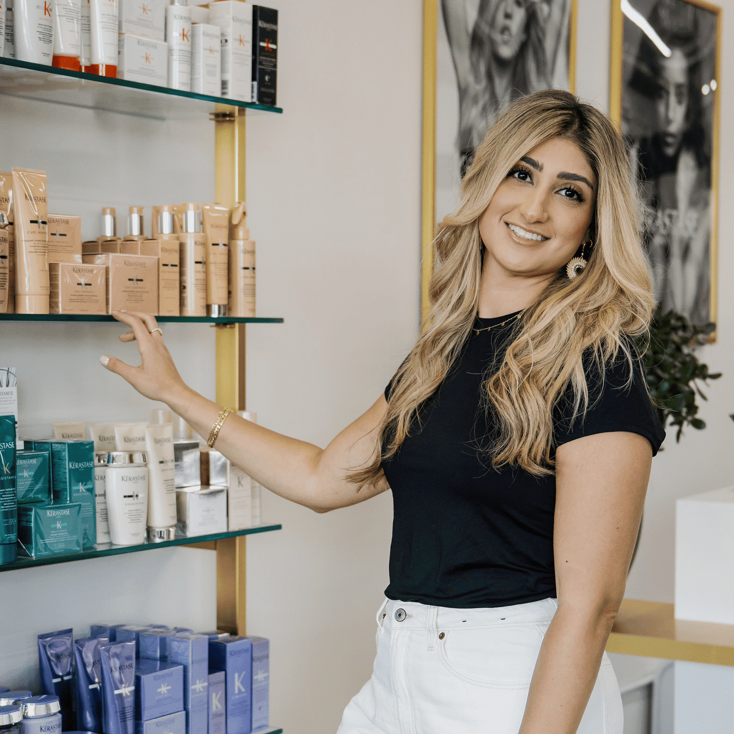 Portrait of Loraina, a professional stylist at Tamed Hair Studio, showcasing their expertise and style.