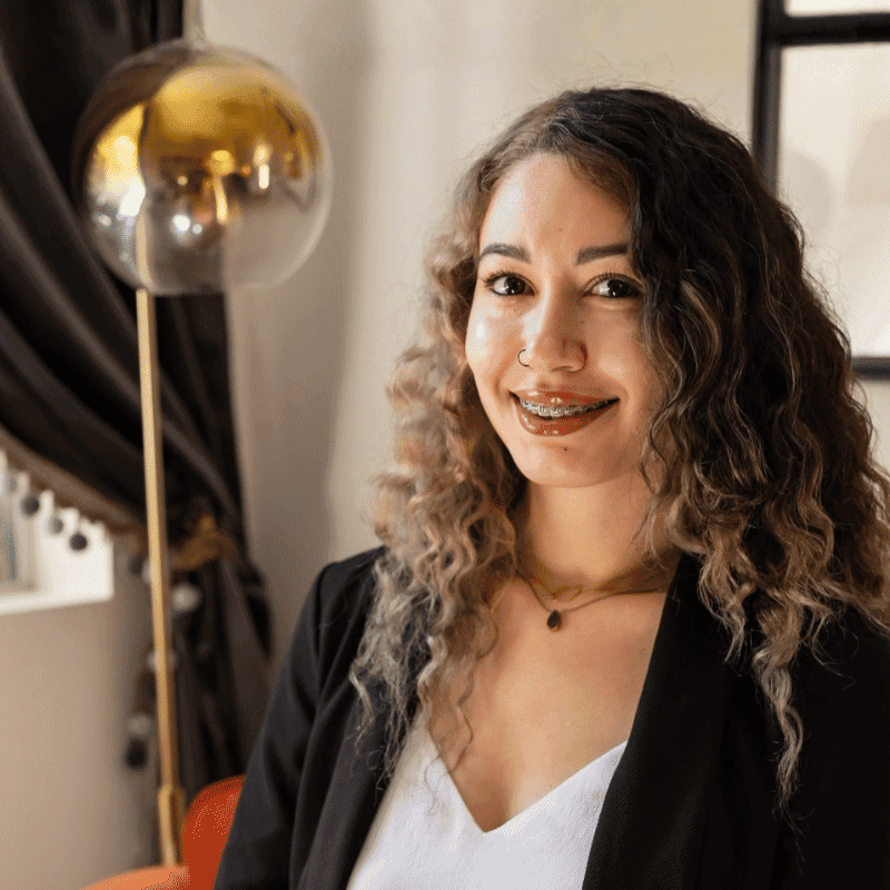 Portrait of Jennay, a professional stylist at The Switch Suites, showcasing their expertise and style.