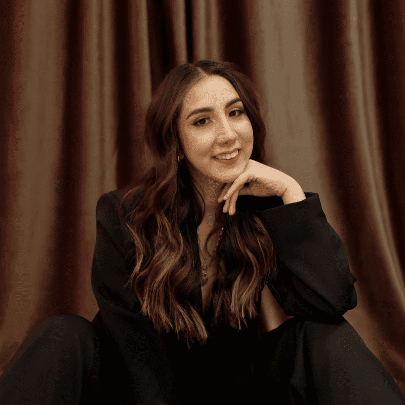 Portrait of Zaylee, a professional stylist at The Switch Suites, showcasing their expertise and style.