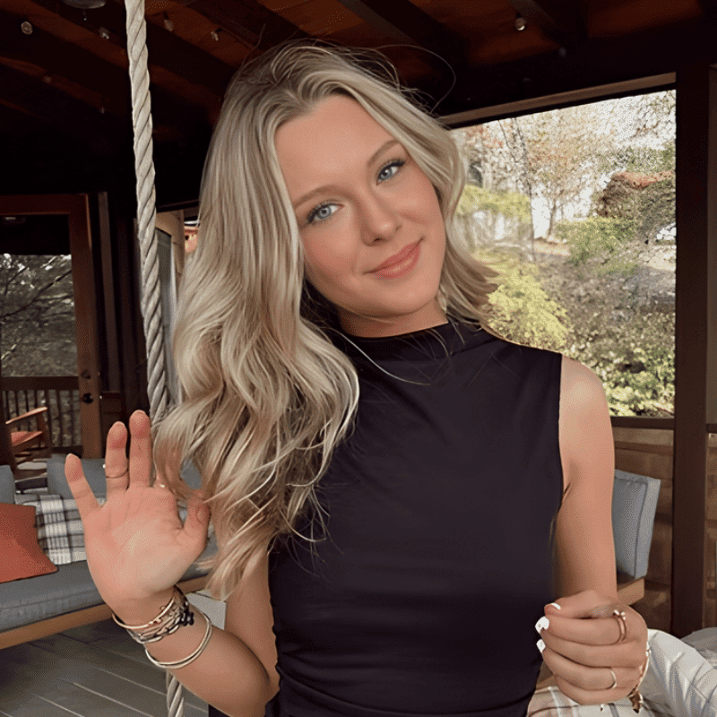 Portrait of Kristen Botkin, a professional stylist at The Wildflower Collective LLC, showcasing their expertise and style.