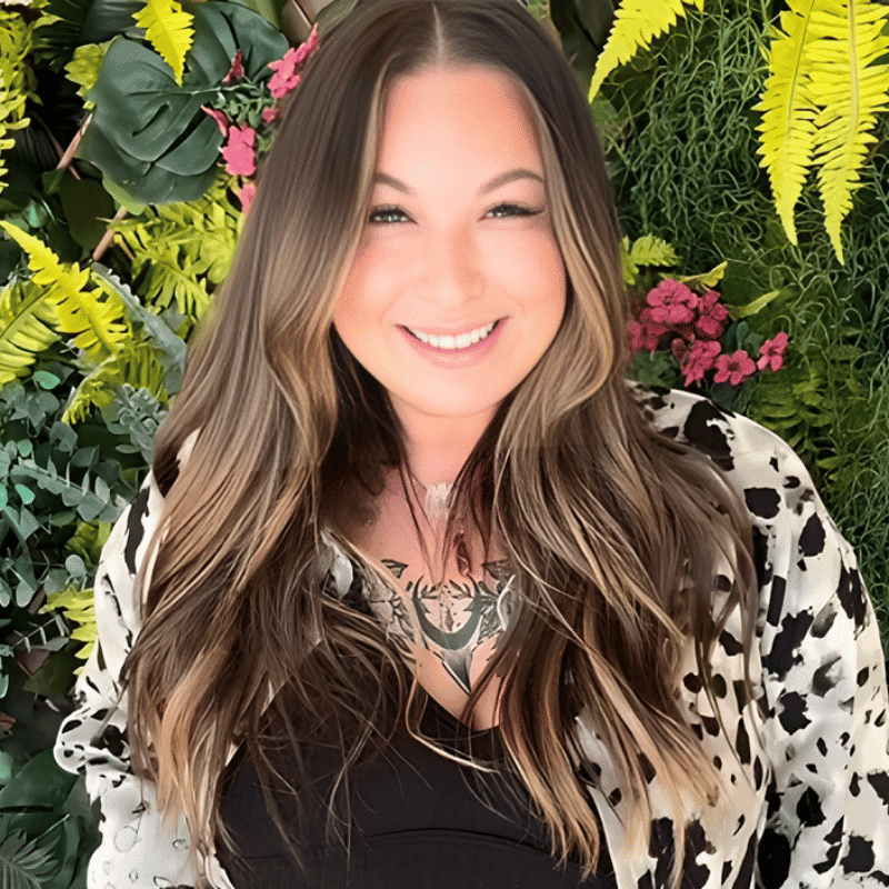 Portrait of Hope Adams, a professional stylist at The Wildflower Collective LLC, showcasing their expertise and style.