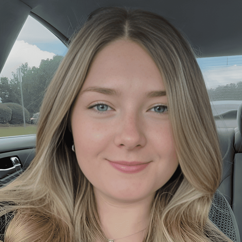 Portrait of Kelly Smith, a professional stylist at The Wildflower Collective LLC, showcasing their expertise and style.